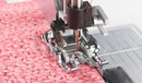Pied quilting avec guide bord droit semelle interchangeable
